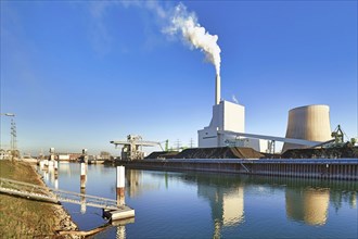 Steam power plant at Rhine river in Karlsruhe in Germany used for generation of electricity and