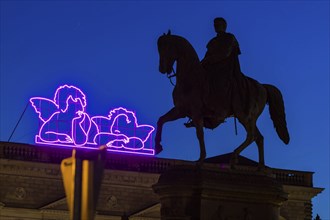 Equestrian statue of King John of Saxony on the evening theatre square. Since the reopening of the