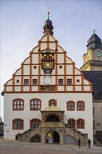 Old town hall with the textile museum. The art clock in the gable was installed by the Hof master