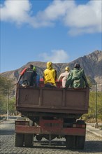 Young men on lorry. Santiago. Cabo Verde. Africa