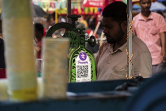 A Unified Payment Interface (UPI) barcode, or QR code, is kept at a stall for customers to make