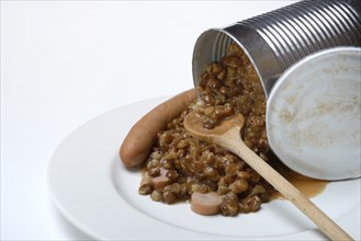 Lentil (Lens culinaris) dish in tin and sausages, lentil