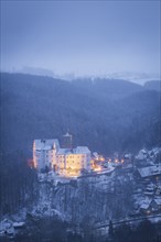 Scharfenstein Castle is a Spornburg on an elongated spur above the village of Scharfenstein