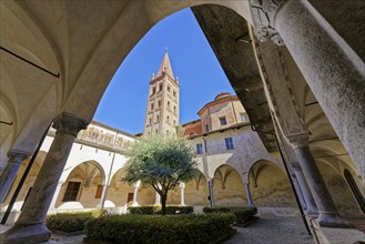 Cloister and church tower, San Giovanni, Saluzzo, Province of Cuneo, Piedmont, Italy, Europe