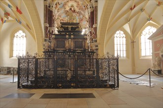 High altar with decorations in the Romanesque Cathedral of St. Mary, interior view, metal grille,