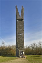 Weilbach, Germany, February 2020: Modern observation tower at regional park with couple relaxing in