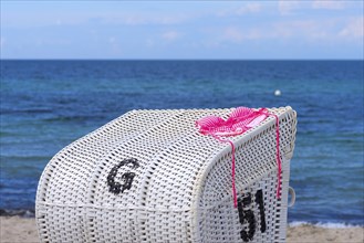 Red bikini drying on a beach chair, Heiligendamm, Mecklenburg-Western Pomerania, Germany, Europe