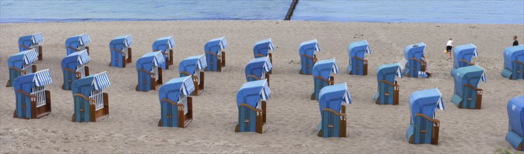 Blue beach chairs on the beach of Kühlungsborn, Mecklenburg-Vorpommern, Germany, Europe