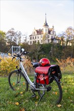 Symbolic image Resting on an e-bike tour in the Leipzig region in Grimma at the Mulde bridge