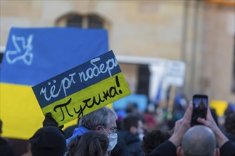 In Dresden, about 3, 000 people gathered on Neumarkt in front of the Church of Our Lady. On posters