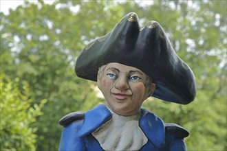 Sculpture Baron von Münchhausen in the castle park, Lying Baron, uniform, blue, white, black, hat,