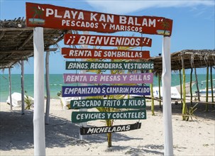 Painted wooden beach signs at Playa Kan Balam, Celestun, Yucatan, Mexico, Central America