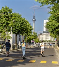 Tourists on electric scooters in inner-city traffic, Berlin, Germany, Europe