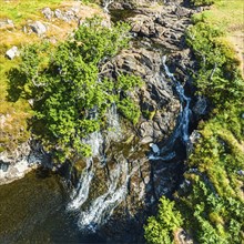 Eas Fors Waterfall from a drone, Isle of Mull, Scottish Inner Hebrides, Scotland, UK