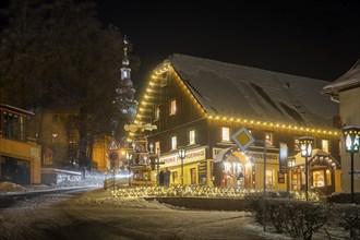 Snow-covered Seiffen with the mountain church