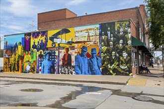 Tulsa, Oklahoma, History in the Making, a wall painting by artist Skip Hill, depicts residents of