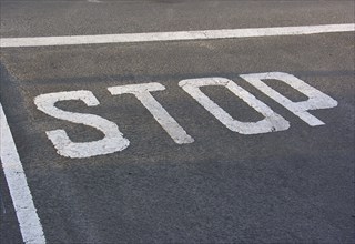 Marking on the road, Stop lettering, Stop sign, Request to stop, Road marking, Traffic sign