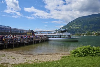 Lake shore, jetty, excursion boat, tourists, summer, Ossiach, Lake Ossiach, Carinthia, Austria,