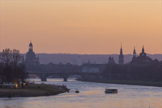 Evening sky over the old town of Dresden with the Church of Our Lady, the castle tower, the