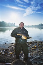 Fishing of the castle pond in Moritzburg