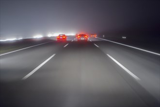 View from a Car Drive at Night at the Road with Fog, Highway, A3, Frankfurt, Hesse, Germany, Europe