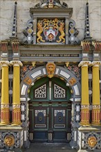 Main portal with colourful wood carving on Münden Town Hall, Weser Renaissance, Hann. Münden or