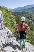 Climber on the rope, multi-pitch climbing, Via la Bellezza della Venere climbing tour, Garda