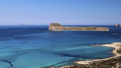 View of an island in the blue sea under a clear sky, Venetian Sea Fortress, Gramvoussa, Gramvoussa