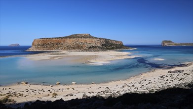 Rocky island with shallow water and sandbank, peaceful and quiet natural scenery, Gramvoussa,