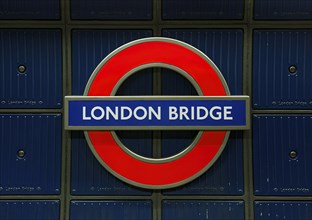 London Bridge' underground sign in blue and red, iconic for London's transport system, London,