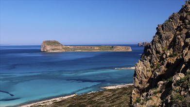 View of a rocky coastline with blue sea and clear sky, Venetian Sea Fortress, Gramvoussa,