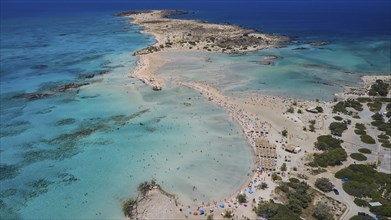 Overtourism, Tourists on the beach, Sunshades, A beach with turquoise waters, ideal for a relaxing