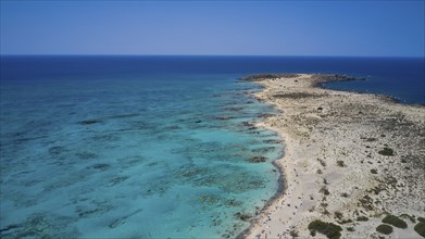 A sandy beach leading out to the clear blue sea, perfect for a relaxing holiday, Elafonissi,