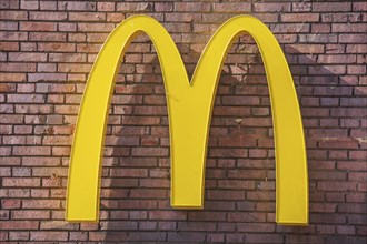 McDonald's logo on a brick wall, Germany, Europe