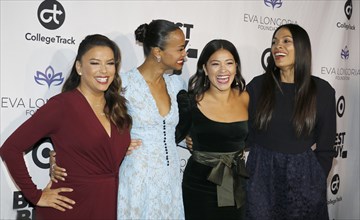 Eva Longoria, Zoe Saldana, Gina Rodriguez and Rosario Dawson at the Eva Longoria Foundation Dinner