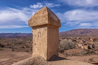 An old kasbah that served as a base for nomadic tribes, with a sense of ruggedness and adventure