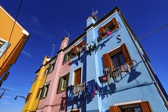 Burano island, famous for its colorful fishermen's houses, in Venice, Italy, Europe