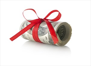 Dollars tied with a red ribbon isolated on a white background