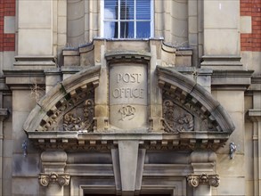 Scarborough, North Yorkshire, United Kingdom, 10 September 2022: sign above the stone doorway of