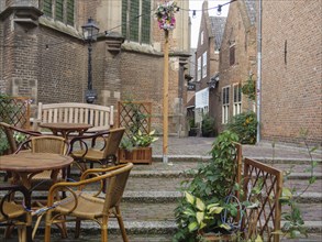 Cosy café with chairs and tables in a historic setting, nijmegen, the netherlands