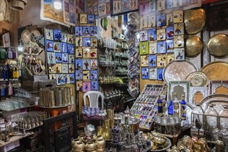 Shop with typical furniture items for sale in a souk in Marrakesh Morocco