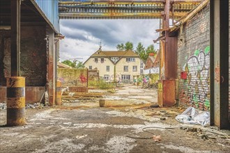 Industrial complex with abandoned buildings and a damaged road, Metallwerke Bender, Lost Place,