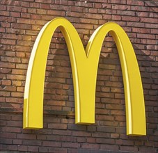 McDonald's logo on a brick wall, Germany, Europe