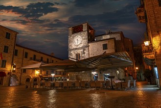 Moody sky over the Clock Tower in the Old Town of Kotor, Montenegro, Europe