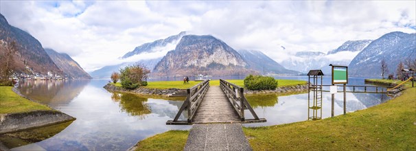 Late autumn panorama with the Hallstatter lake, the Northern Limestone Alps, the island on the lake