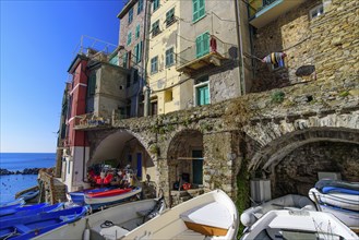 Riomaggiore, one of the five Mediterranean villages in Cinque Terre, Italy, famous for its colorful