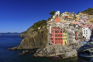 Riomaggiore, one of the five Mediterranean villages in Cinque Terre, Italy, famous for its colorful