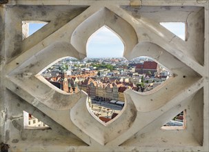 Aerial view of Wroclaw through architectural ornament on observation deck, Poland, Europe