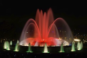 The colorful water show of Magic Fountain of Montjuic with light and music in Barcelona, Spain,