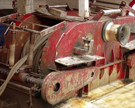 An old winch used to haul in the nets on a local fishing boat in Taiwan